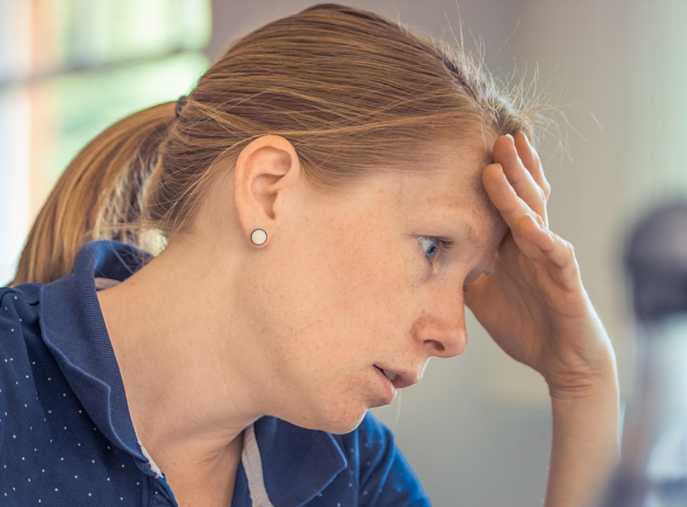 woman stressed because of poor skylight installation Toronto